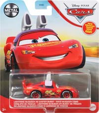 Lightning McQueen as Easter Buggy from the Cars 2021 series, Mattel 1:55 diecast on its card